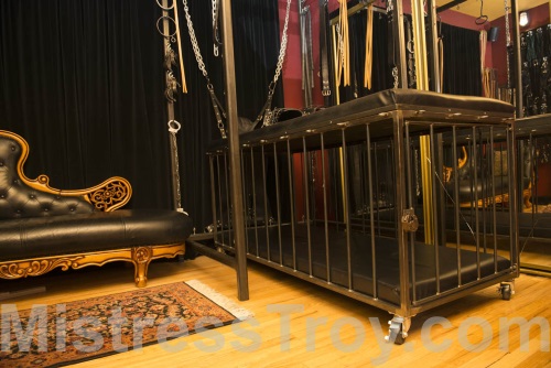 MISTRESS TROY FemDomme NYC has a dungeon with leather BDSM equipment