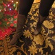 Dominatrix Mistress Troy wears olive-green suede Cole Haan boots to a Christmas gathering