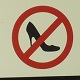 Warning sign on Italian hiking path