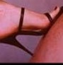 Mistress Troy's legs and heels on slave's back